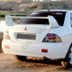 Бампер задний с отверстиями в цвет кузова Mitsubishi Lancer IХ (2000-2010) Бампер задний с отверстиями в цвет кузова Mitsubishi Lancer IХ (2000-2010)